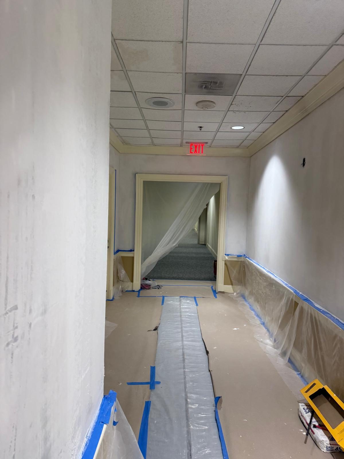 Interior painting in progress — corridor